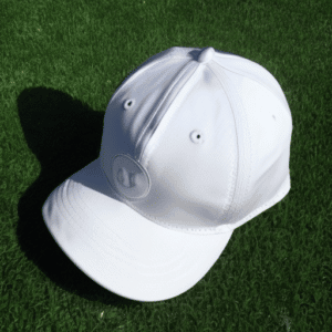 a-white-cap-on-course