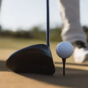 A golfer ready to hit the ball