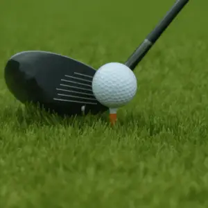 a black ceramic clubhead and a golf ball
