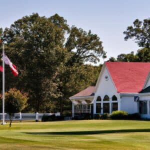 A clubhouse located in the middle of a golf course