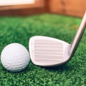 A golf ball and a DIY golf club