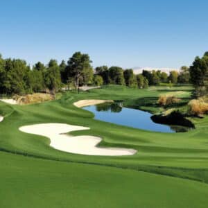 a beautiful golf course with sand and water hazards