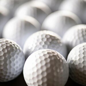 a close-up view of several golf balls