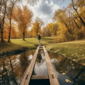 a golfer holding his club on a wooden bridge