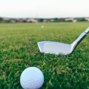 a titanium golf club and a golf ball