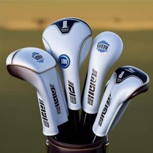 golf clubs covered by white golf head covers