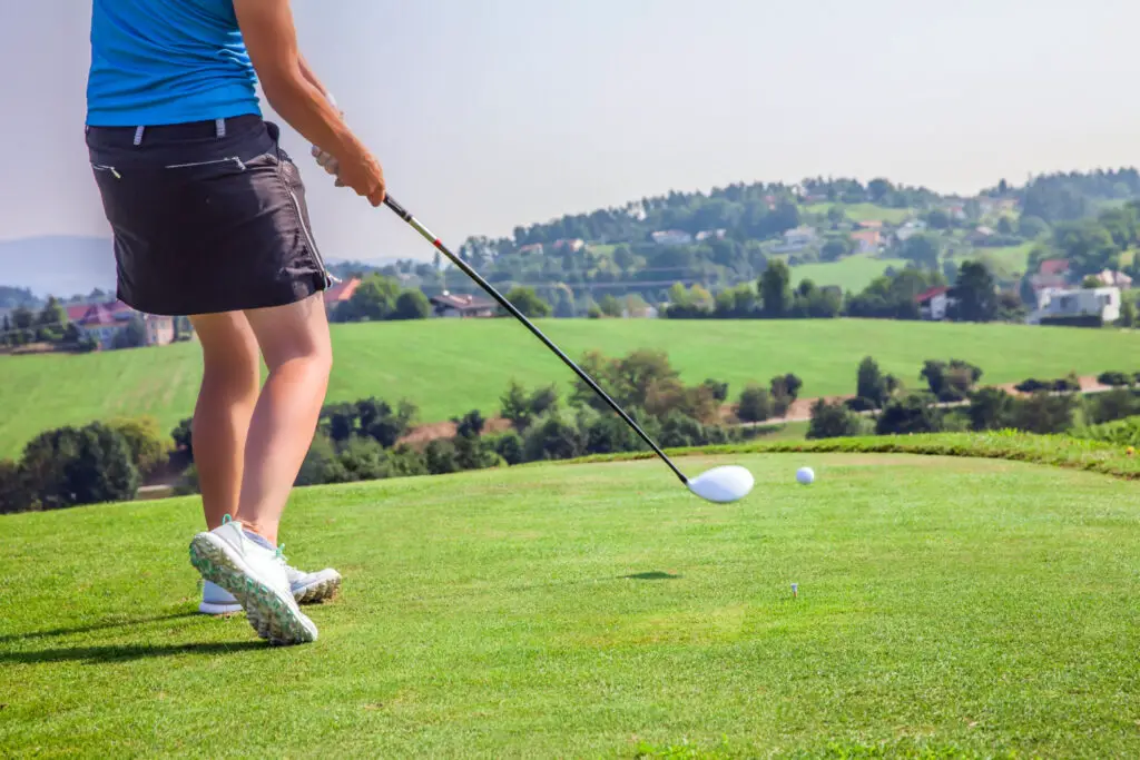 a professional golfer playing in golf course