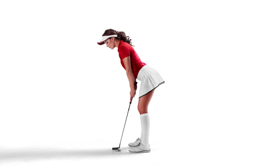 a woman in golf positioning