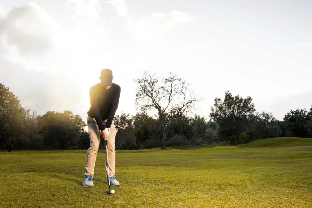 front view of a man in golfing posture