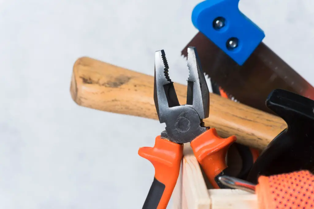 wooden toolbox with different tools